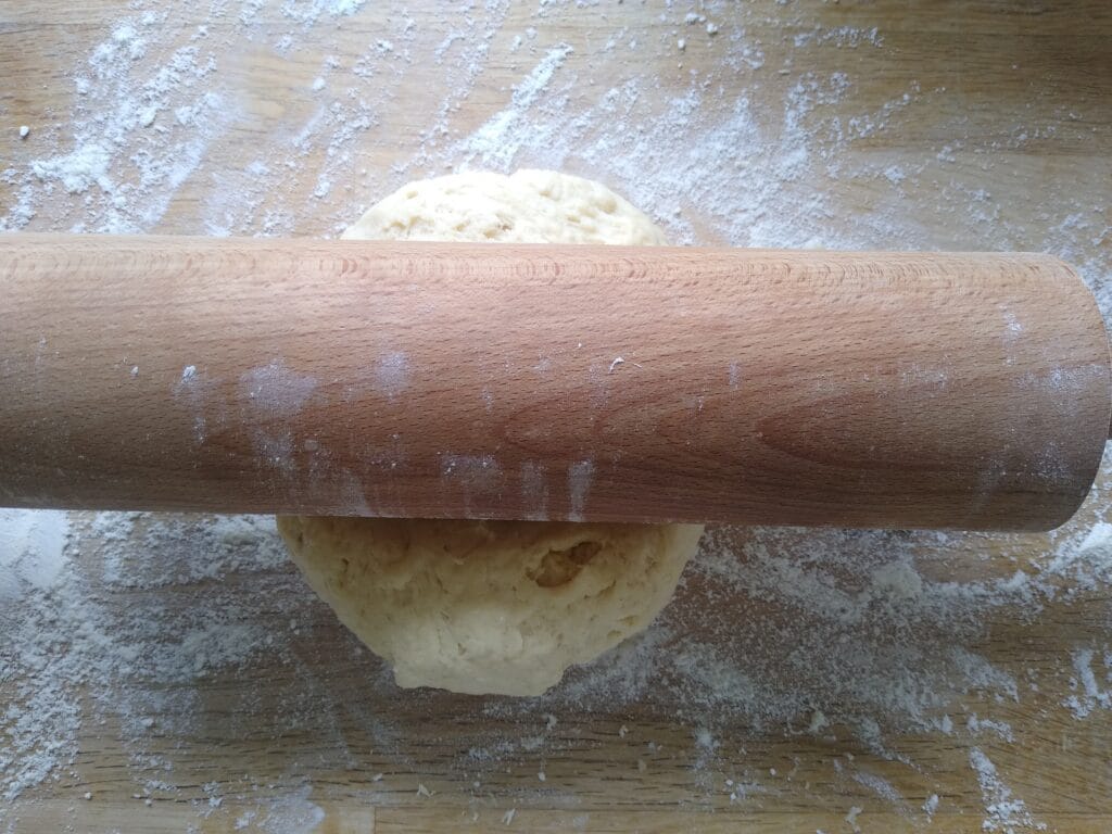 Rolling pin and biscuit dough.  Dinky Bakers simple cooking.